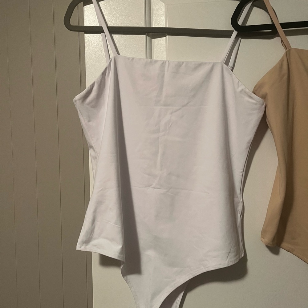 ReoRia Women's double lined Bodysuits in White only